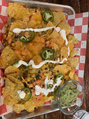 Nachos ($11) plus side of guacamole ($2)