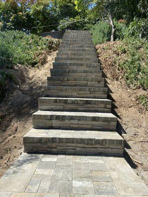 Installation of pavers on concrete steps