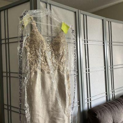 The dress given to us late.  Supposed to be ready in April, and 4 months later in August it was done.