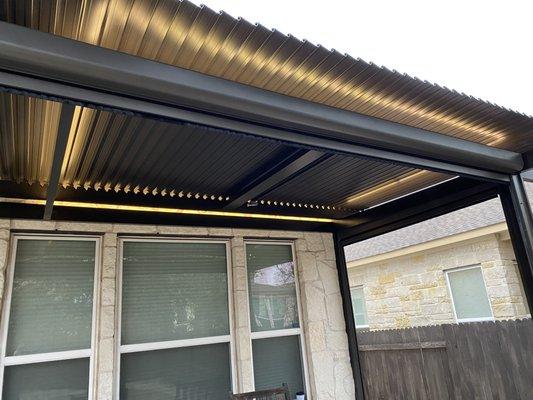 Motorized louvered roof system closed