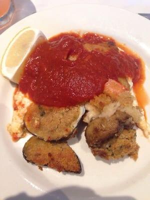 Eggplant rolatini. Baked clam / mussel. Stuffed mushroom appetizer plate at party.