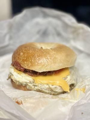 Bacon, fried egg and cheddar on a bagel. Yum!