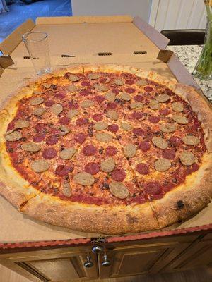 Pepperoni and sausage pizza. LARGE. Like, VERY LARGE.