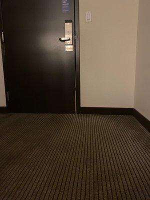 Gap in door so you can hear everything in the hallway