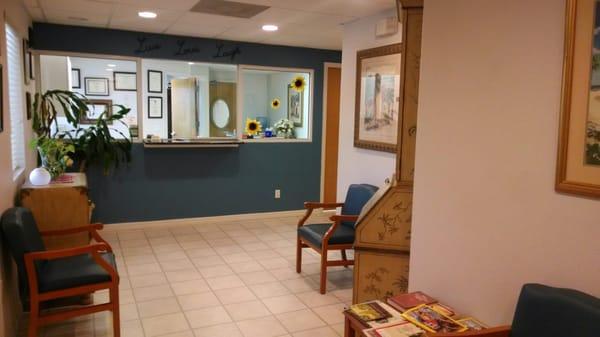 Our cozy waiting room and front desk.