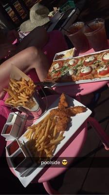 Fries, chicken fingers and pizza.