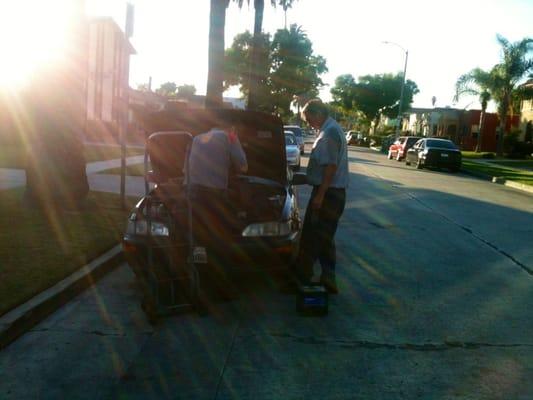 David & Roger changing my battery at my house!