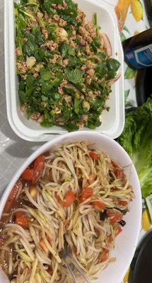 Chicken laab , papaya salad with noodle. Big portions