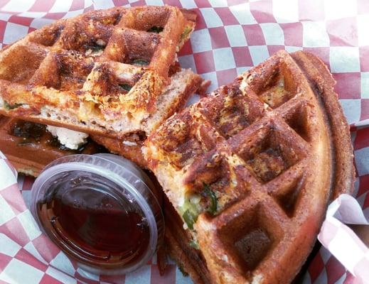 Chick n my waffle. Freshly fried chicken with creamy cheese, jalapeno jam, and syrup, sandwiched between waffle