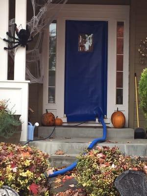 Our unique Seal-a-Door. It keeps the cold air out while letting the hoses from the truck mount machine in.