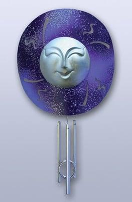 Smiling moon with magical look of the galaxy.  Securely attaches to any window with two quality suction cups.  Silvery face,