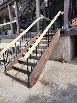 Replaced new stringers and hardware. We reused steps and handrails.