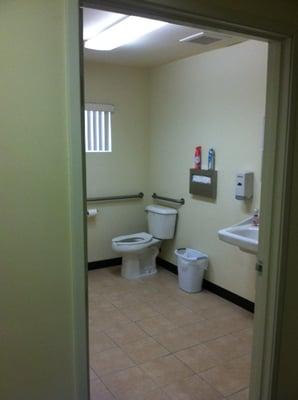 Clean well-appointed ADA-compliant restroom.