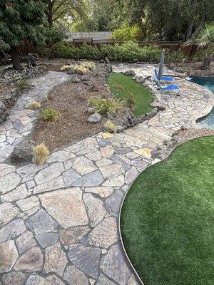 Flagstone is a very natural way to create a beautiful outdoor oasis