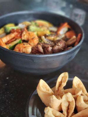 Shrimp & Angus Steak Hibachi Combo, with noodles and it includes a veggie medley of zucchini, mushrooms, onions, etc