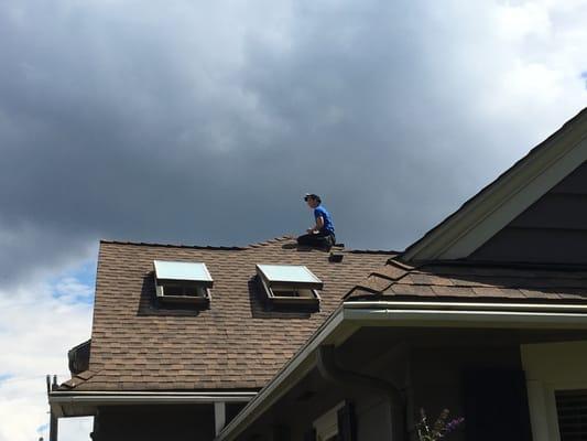 Inspecting a roof in Portage Bay.  You should have seen the view of Lake Washington!