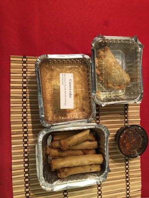 Chicken egg rolls, beef empanada and cassava cake