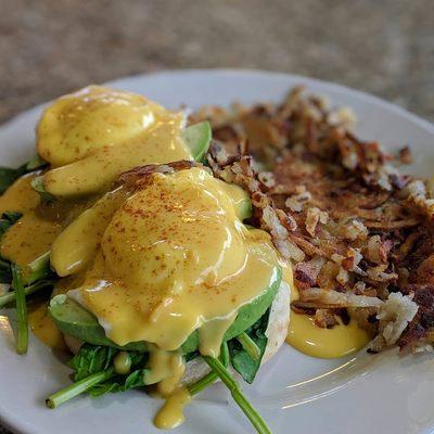 Avocado Benedict (Poached eggs, toasted english muffin, avocado, tomatoes, spinach, hollandaise sauce, and hash browns) ThatsDelishIsh.com