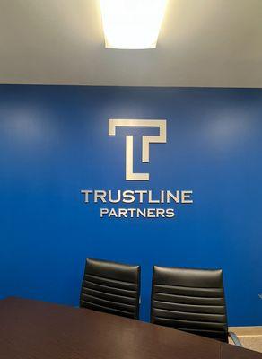 TrustLine Partners conference room.