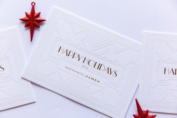 Custom Holiday Cards. Blind hit with gold foil.