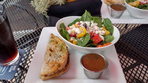 Half Sandwich and Greek salad.  Great food and look how pretty !