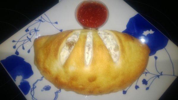 one of our fresh baked calzones