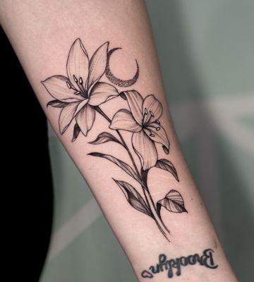 Lilies and moon tattoo