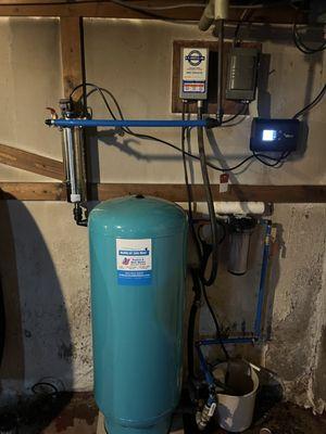 Wellrite pressure tank install with Viqua UV sterilization system.