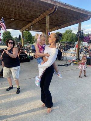 All ages enjoying the band at the cabana