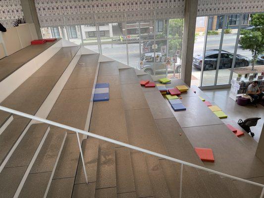 Bleacher seating from the first to second floor. There are sometimes activities that take place here.