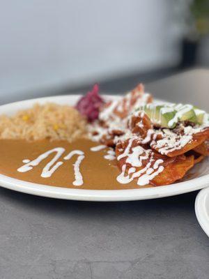 Chilaquiles rojo with a side of machaca