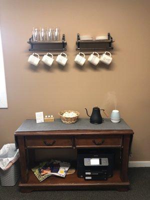 Our upstairs shared reception area has a tea and hydration station for your comfort.