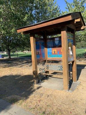 Artwork and bench area.