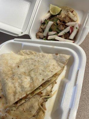 Chicken quesadilla and carnitas taco