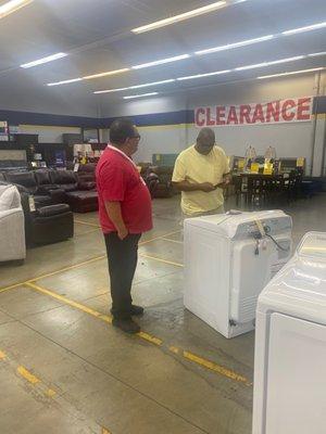 Bob our salesman helping us to pick the best dryer for our house.