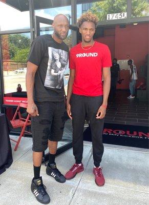 Lamar Odom with gym co-owner and NCAA basketball star Josh Roberts at Opening Event .