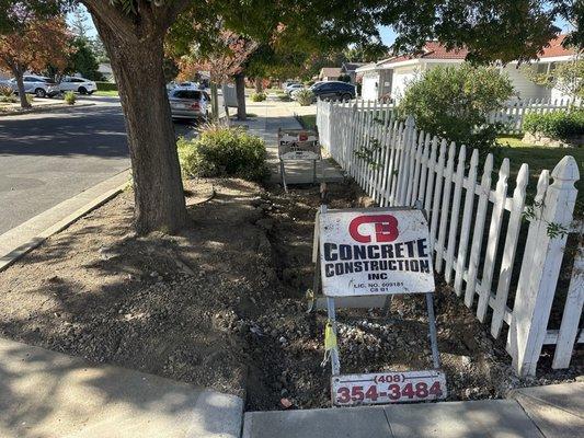 CB redoing sidewalk in front of my house.