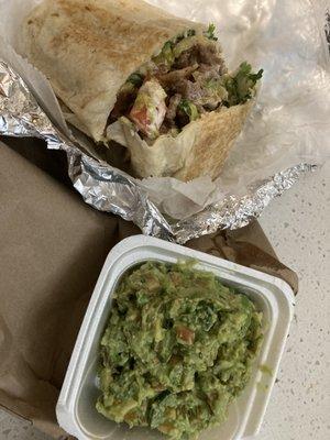 Steak burrito and fresh guacamole