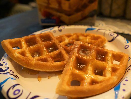 Krusteaz waffles are the best. Topped with salted butter and maple syrup. Restaurant quality.