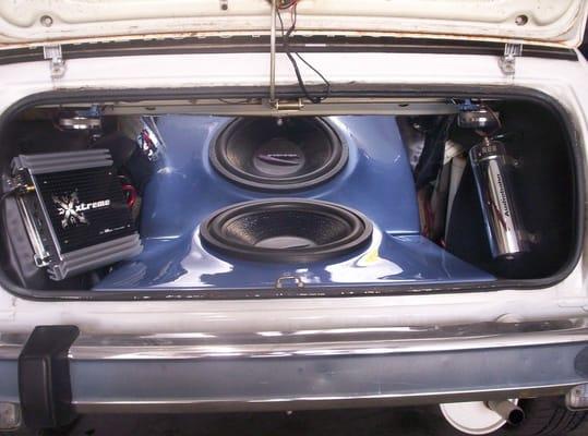 15" woofer with 350w amplifer in custom made painted fiberglass enclosure installed in 1979 Honda Civic trunk