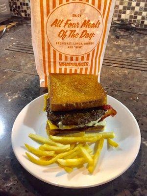 Sweet and spicy bacon burger on optional Texas toast with a few fries