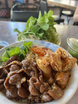 Vermicelli with spring rolls and BBQ pork