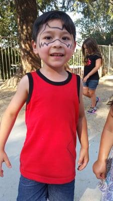 He kept saying: "look mommy look, I'm a super hero!" He enjoys face paintings as much as his little sister!