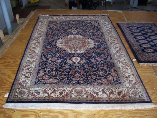 Here is the very same rug after our Professional Cleaning Package.