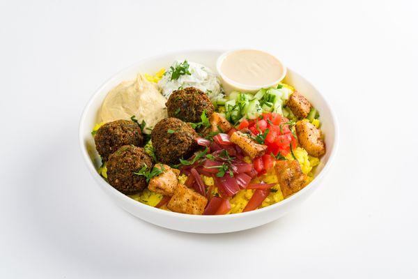 falafel, hummus, pickled onions, tomatoes, cucumbers, pita chips, saffron basmati rice and lemon tahini dressing