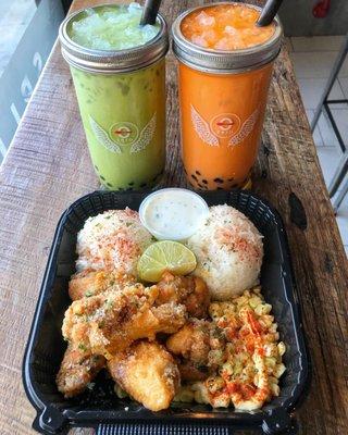 Entree combo meal of Crispy Chicken Wings with XXTRA Flamin' Hot Cheetos Elotes and Rice pictured with Matcha Milk Tea and Thai Milk Tea.