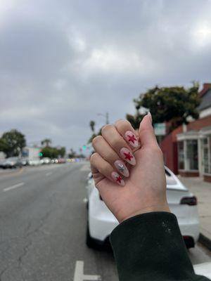 long gel x almond nude nails w star designs