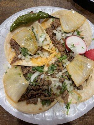 Carne asada 5/5 and birria meat 4/5 tacos