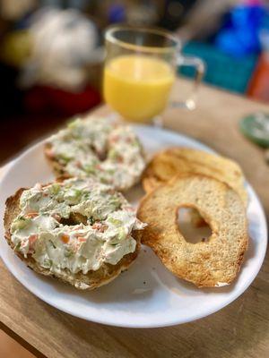 Everything bagel with veggie cream cheese and buttered bialy