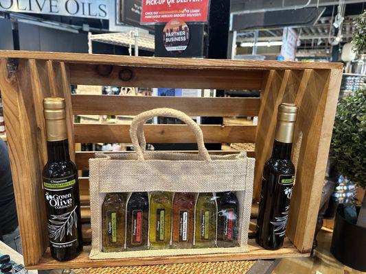 Oils to Go-EVOO's and fused oils all in a handy tote. Arrive at your next party prepared with different oiling options!